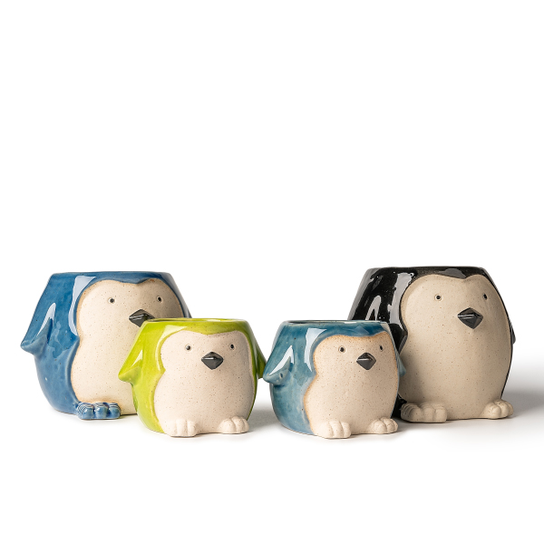 Pinguïnvormige keramische kandelaars: schattig en gezellig licht- en schaduwkunst